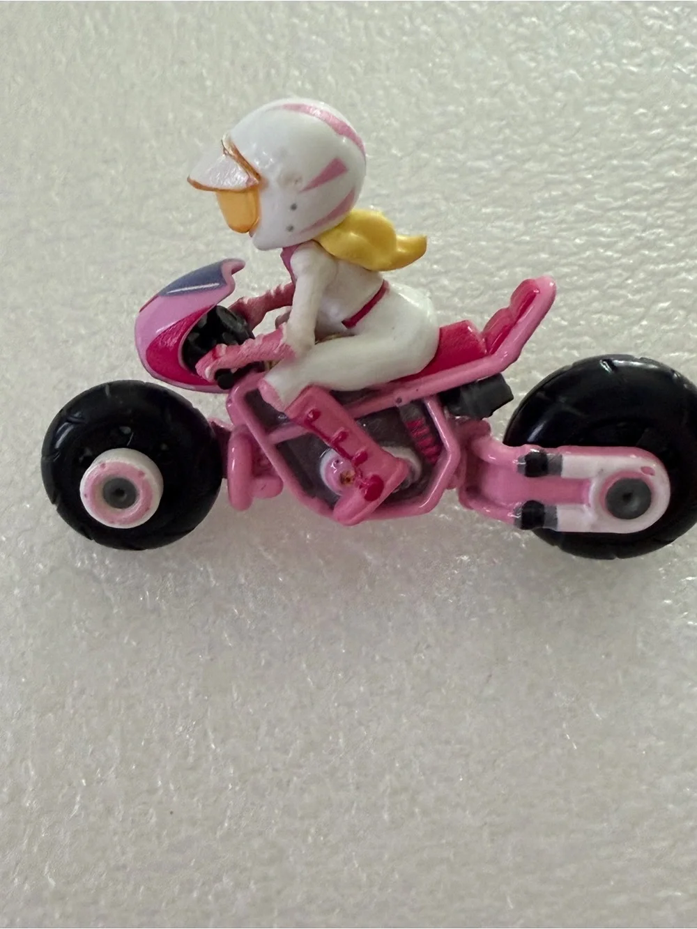 The Hot Wheels Mario Kart 4 Pack Super Mario Bros Movie featuring Princess Peach